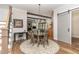 Inviting dining area features wood floors, neutral colors, and open floor plan at 251 Gentry Dr, Pittsboro, NC 27312