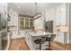 Beautiful kitchen with an island, stainless steel appliances, stylish backsplash, and ample cabinet space at 251 Gentry Dr, Pittsboro, NC 27312