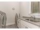 Laundry room featuring modern appliances, patterned tile flooring, a sink, and a large window at 251 Gentry Dr, Pittsboro, NC 27312