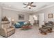Inviting living room with plush seating and plenty of natural light from windows at 251 Gentry Dr, Pittsboro, NC 27312