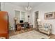 Functional home office space with ample natural light and a comfortable workspace at 251 Gentry Dr, Pittsboro, NC 27312
