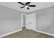This bedroom has neutral walls and two white doors at 2710 E Greensboro Chapel Hill Rd, Snow Camp, NC 27349