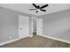 This bedroom has neutral walls and two white doors at 2710 E Greensboro Chapel Hill Rd, Snow Camp, NC 27349