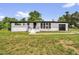 Charming renovated brick home featuring a well-manicured lawn and an attached garage at 2710 E Greensboro Chapel Hill Rd, Snow Camp, NC 27349