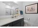 Bright bathroom with a white countertop vanity, framed mirror, and modern decor at 30 Futrell Ridge Ct, Chapel Hill, NC 27517
