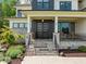 Inviting front entrance with stone steps, modern front door, and stylish accents at 30 Futrell Ridge Ct, Chapel Hill, NC 27517