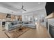Spacious living room featuring an open floor plan, fireplace, and hardwood floors at 30 Futrell Ridge Ct, Chapel Hill, NC 27517