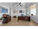 Spacious home office with vaulted ceilings, modern furniture, and ample natural light at 30 Futrell Ridge Ct, Chapel Hill, NC 27517
