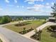 Beautiful street view of a modern home with well-manicured lawns and lush landscaping at 30 Futrell Ridge Ct, Chapel Hill, NC 27517