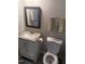 Functional bathroom with a sink vanity, toilet, mirror and towel rack at 3049 Huntleigh Dr, Raleigh, NC 27604