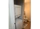 Convenient stacked washer and dryer unit located in the bathroom at 3049 Huntleigh Dr, Raleigh, NC 27604