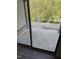 View of outdoor green space and a body of water from a concrete patio at 3049 Huntleigh Dr, Raleigh, NC 27604