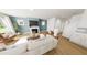 Cozy living room with a fireplace, comfortable seating, and natural light at 328 Beacon Dr, Pittsboro, NC 27312