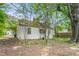 Charming single-Gathering home nestled among mature trees in a serene backyard setting at 331 Highland Ave, Burlington, NC 27217