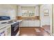 Kitchen with laminate countertops and cabinets at 331 Highland Ave, Burlington, NC 27217