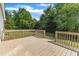 The back deck is spacious and perfect for outdoor relaxing and entertaining at 3608 Deering Dr, Raleigh, NC 27616