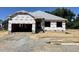 New construction home featuring the exterior prior to the installation of siding and brick at 37 Shoreline Dr, Lillington, NC 27546
