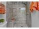 Walk-in shower featuring marble style tiling, a built-in bench, and a shower head at 3725 Fernwood Dr, Raleigh, NC 27612