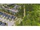 Aerial view of community, showcasing the neighborhood layout, surrounding greenery, and proximity to nature at 4009 Reunion Creek Pkwy, Apex, NC 27539