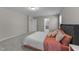Comfortable carpeted bedroom with calming colors, ensuite bathroom, and a restful ambiance at 4009 Reunion Creek Pkwy, Apex, NC 27539