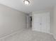 Bedroom featuring carpet, closet and adjoining room through an open door-frame at 4009 Reunion Creek Pkwy, Apex, NC 27539