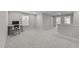 Well-lit upstairs bonus room with soft carpet; perfect for a home office or study space at 4009 Reunion Creek Pkwy, Apex, NC 27539