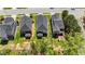 An aerial shot showcases homes with screened porches and manicured lawns at 4009 Reunion Creek Pkwy, Apex, NC 27539