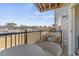 Balcony with seating area and views of the lake, providing a perfect outdoor space for relaxation at 408 Gaston Park Ln # 100, Wake Forest, NC 27587