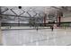 Spacious indoor ice rink featuring a smooth surface and overhead lighting, ready for skating enthusiasts at 408 Gaston Park Ln # 100, Wake Forest, NC 27587