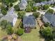Aerial view of a home showcasing its backyard deck and solar panels at 449 Sandy Whispers Pl, Cary, NC 27519