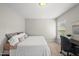 Bedroom features a neutral color scheme, plush carpeting, and a window at 449 Sandy Whispers Pl, Cary, NC 27519