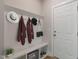 Functional mudroom with built-in storage, coat hooks, and stylish decor at 45 Addison Pond Ct # 11, Zebulon, NC 27597