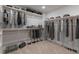 Organized walk-in closet with ample storage, racks, and shelving at 45 Addison Pond Ct # 11, Zebulon, NC 27597