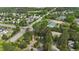 View of the property within a lush green neighborhood near businesses and main thoroughfares at 4500 Hollirose Pl, Raleigh, NC 27616