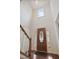 Elegant entryway featuring high ceilings, hardwood floors, and a beautiful wooden front door with sidelights at 4500 Hollirose Pl, Raleigh, NC 27616