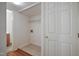 Laundry room area with tile floor and wire shelving at 4500 Hollirose Pl, Raleigh, NC 27616