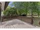Spacious wooden deck provides a great outdoor entertainment space at 5713 Timber Ridge Dr, Raleigh, NC 27609