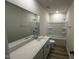 Bathroom featuring double sink vanity, large mirror and shower-tub at 580 Thomas Gage Dr, Fuquay Varina, NC 27526