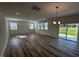 Bright living room with plenty of natural light and sliding glass doors leading to the backyard at 580 Thomas Gage Dr, Fuquay Varina, NC 27526