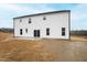 This home features a backyard with a concrete patio and lawn at 60 Rosewood Ln, Youngsville, NC 27596