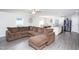 Bright and airy living space with an open layout, modern floors, and stylish furnishings at 608 Crackling Ct, Zebulon, NC 27597