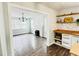 Open-concept living room showcasing fireplace, mantle, and an abundance of natural light at 614 Henry St, Rocky Mount, NC 27803