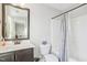 Bathroom featuring a single vanity, a toilet, and a shower with whale shower curtain at 6323 Pesta Ct, Raleigh, NC 27612