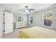 Bright bedroom with a comfortable bed, dresser, and windows letting in natural light at 6323 Pesta Ct, Raleigh, NC 27612