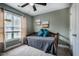 Comfortable bedroom with neutral colors, and a view to the outdoors at 6901 Rex Rd, Holly Springs, NC 27540