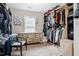 Walk in closet with built in shelving and storage space at 6901 Rex Rd, Holly Springs, NC 27540