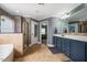 Spacious main bathroom with a vanity and separate shower at 6901 Rex Rd, Holly Springs, NC 27540