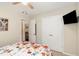 Comfortable bedroom with a ceiling fan, closet, and neutral walls, offering a relaxing retreat at 722 E Pine Ave, Wake Forest, NC 27587