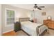 Cozy bedroom featuring neutral tones, natural light, and a comfortable atmosphere at 722 E Pine Ave, Wake Forest, NC 27587