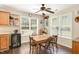 Charming dining area filled with natural light, perfect for Gathering meals and entertaining guests at 722 E Pine Ave, Wake Forest, NC 27587